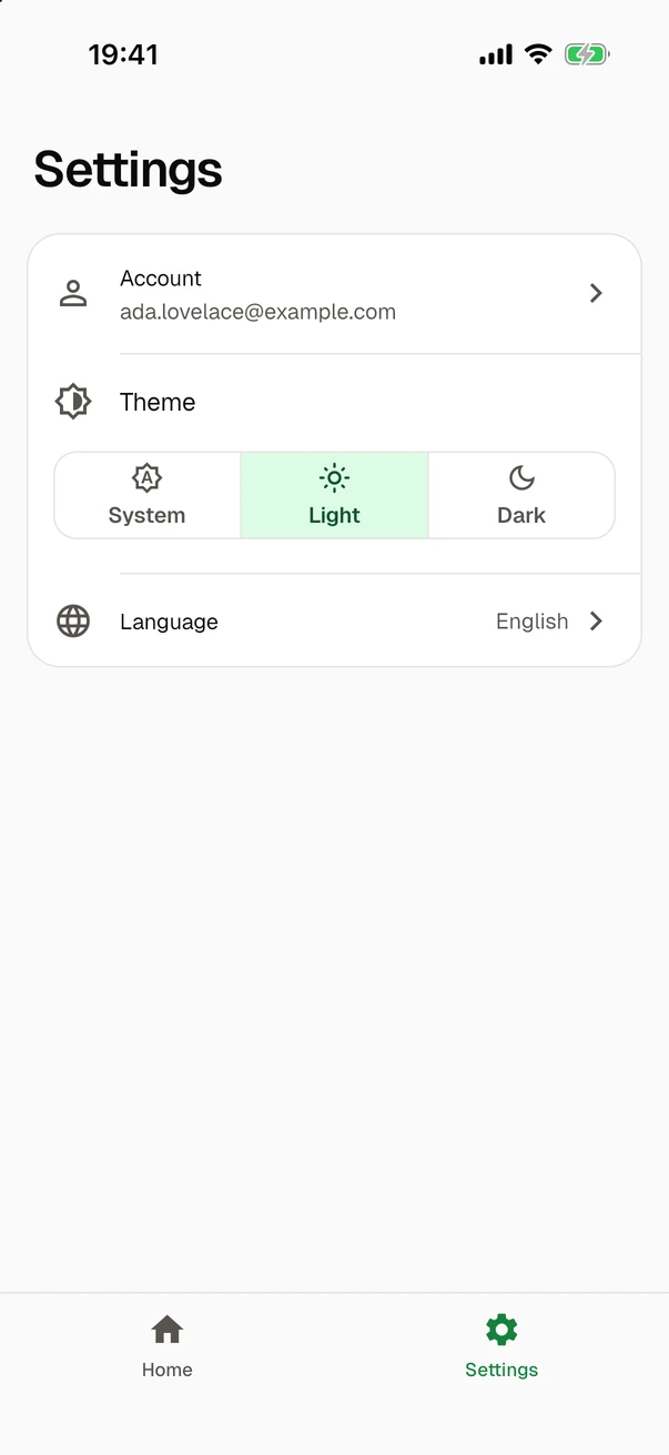 The settings screen in the light theme: the row Account with the address ada.lovelace@example.com, the theme, with Light selected among System, Light and Dark, and the language, which is English.